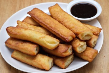 Youtiao These are deep-fried dough sticks often eaten for breakfast or as a snack, sometimes paired with soy milk 