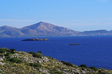 View of the rocky coastline of Attica and islands near the town of Varkiza, in Athens, Greece