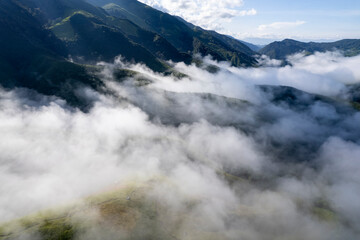 Landscape of Morning Mist with Mountain Layer at north of Thailand. mountain ridge and clouds in rural jungle bush fores - 772743013