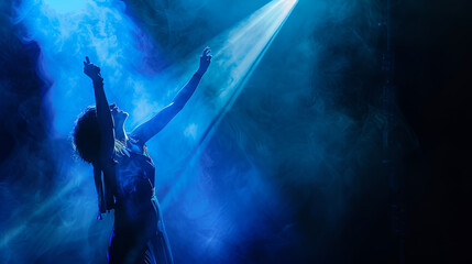 Fototapeta na wymiar Graceful singer with uplifted arm bathed in serene blue