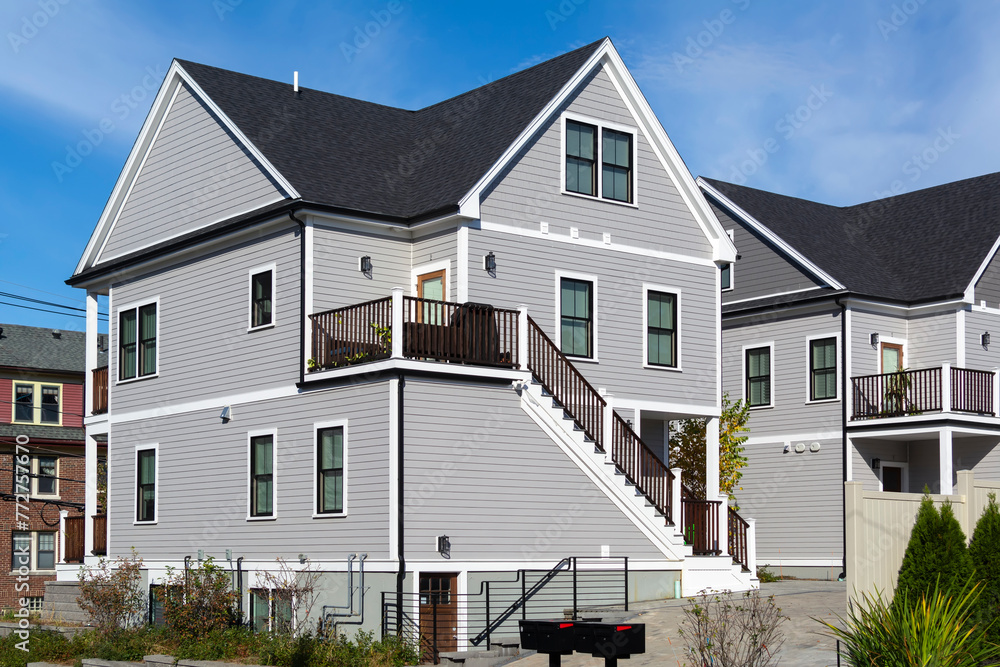 Wall mural Newly built two-story family home with cross-gable roof in Brighton, MA, USA