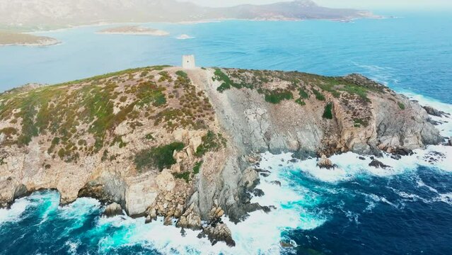 Cabo Malfanato from Above: a Unique Perspective of the Malfanato Tower in Sardinia.