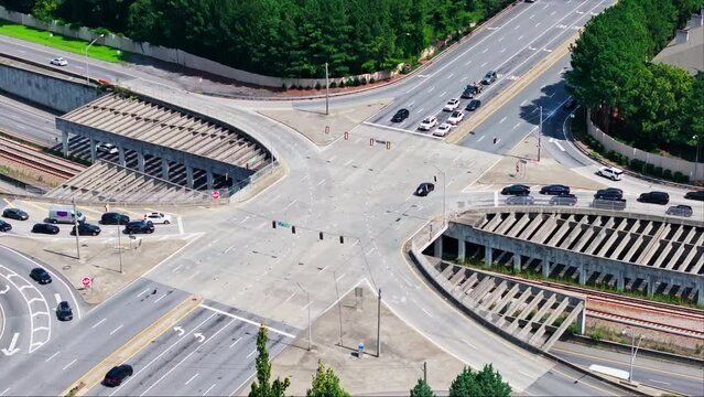 Multi-lane Road Intersection Over Railway Tracks In Atlanta, Georgia. static aerial shot