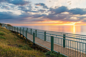 Hallett Cove new coastal boardwalk with sea view at sunset, South Australia
