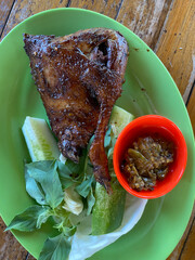 grilled duck with fresh vegetables on the table