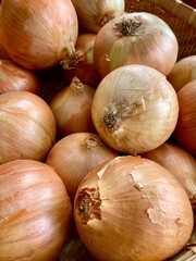 Close-up photo of Taiwan Onion in market. Vegetable texture and background.