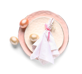 Beautiful table setting with Easter eggs and gypsophila flowers on white background