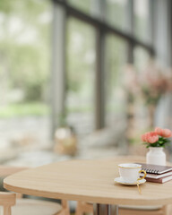 A space for display products on a wooden table in a beautiful contemporary coffee shop.