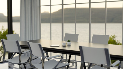 The interior design of a contemporary spacious meeting room with a meeting table.