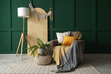 Interior of living room with wind chime and armchair