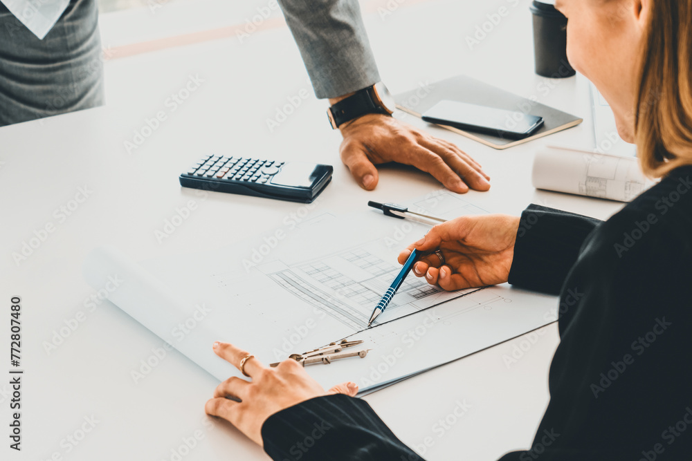 Poster architect and engineer working with construction drawing project on table in office. architecture an