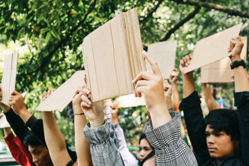 Group of activist holding blank cardboard during a rally or demonstration