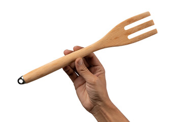 Hand holding wooden fork no background, cutout