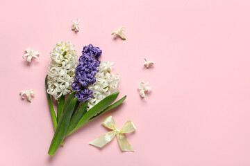 Beautiful hyacinth flowers on pink background. Top view