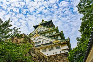 Fototapeta na wymiar Osaka-jo (Osaka Castle)'s Majestic Facade: The Iconic Castle Tenshukaku (Main Tower), July 2015