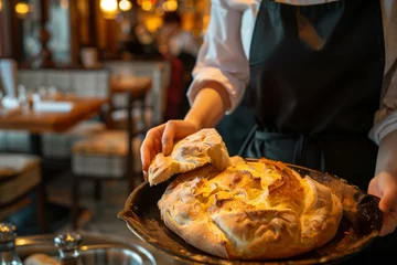 Papier Peint photo Lavable Boulangerie waitress serving fresh ovenbaked bread