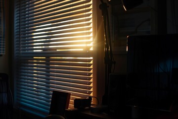 studio at twilight with light peeking through blinds