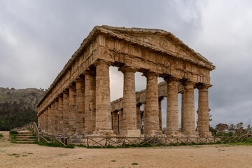 view of the Doric Temple of Segesta under an overcast sky