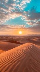 Fototapeta na wymiar Sunset over desert dunes with cloudy sky