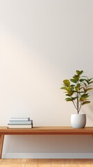 A white vase with a plant in it sits on a wooden table in front of a white wall