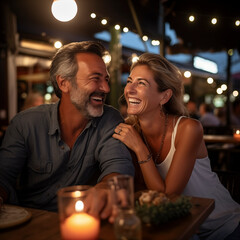 Romantic couple dating night smiling and laughing together having fun. Love and relationship adult people enjoying nightlife. Tourist on vacation. Outdoor leisure activity.