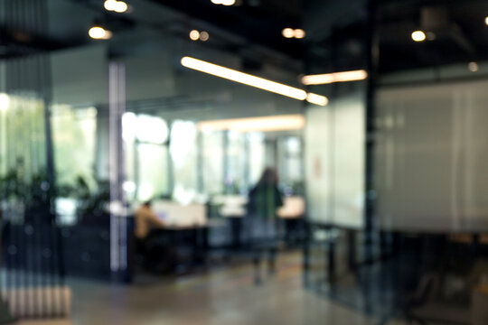 employees blur in the workplace in office with computer or shallow depth of focus of abstract background.