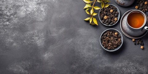Obraz na płótnie Canvas minimalistic design Aromatic pu-erh tea served on grey table, top view