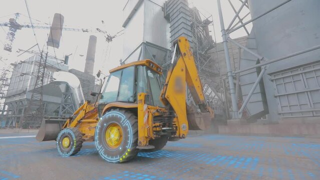 The backhoe works at the construction site. The concept of a smart backhoe. A smart construction site. Visualization of smart construction