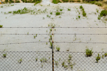barbed wire fence close up