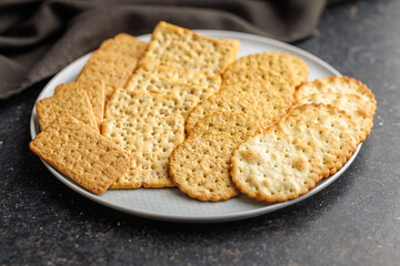 Pile of Crackers on plate on Kitchen Counter
