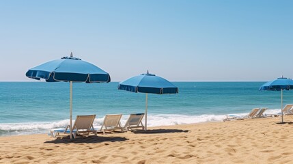 Sandy beach with beach umbrellas and clear blue skies