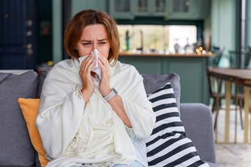 Young woman suffering from cold