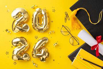 Commemorate graduation with a top-view photograph displaying 2024 gold balloons, a graduation cap, diploma, stationery, books, pencils, glasses, confetti on yellow background. Excellent for advert - obrazy, fototapety, plakaty