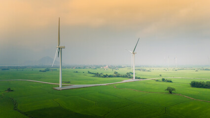 view of turbine green energy electricity, windmill for electric power production, Wind turbines generating electricity on rice field at Phan Rang, Ninh Thuan province, Vietnam