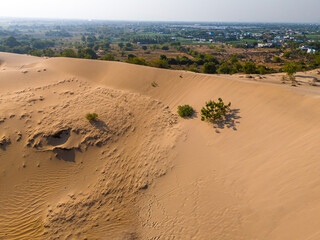 Fototapeta na wymiar Aerial view of Nam Cuong sand dunes, Ninh Thuan province, Vietnam. It is one of the most beautiful places in Vietnam