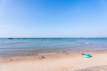view of traditional fishing boats at Mui Ne beach, Phan Thiet, Binh Thuan, Vietnam. Near Ke Ga Cape or lighthouse is the most favorite destination for visitors.