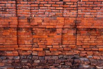 Close up vintage red and brown brick wall background. Grunge background.