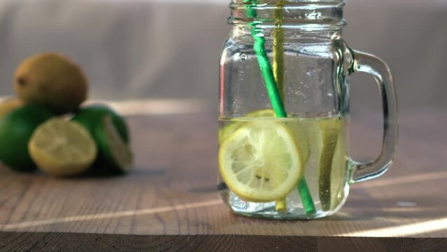 Lemon and lime flavor fizzy water served in glass drinking jar