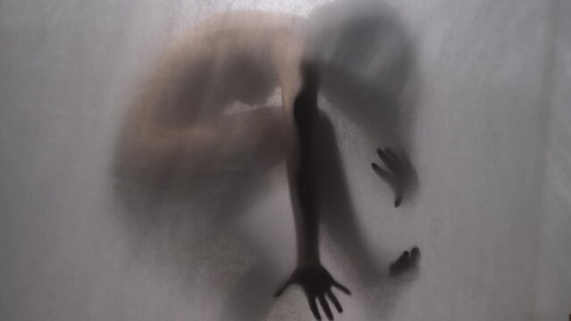 Enigma in Motion - Artistic Silhouette Captured in Transient Grace