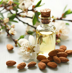Cosmetic almonds oil in bottle with bloom almonds twig