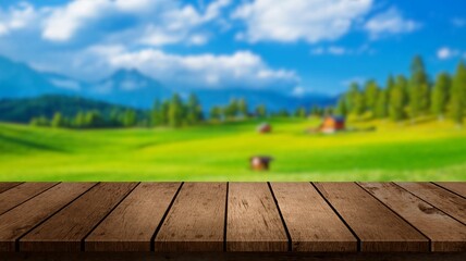 Empty wooden table top blurry green feild view background  