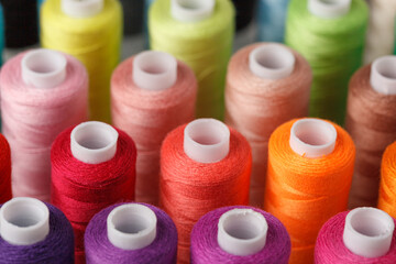 Set of colorful spools of thread