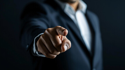 a close up of a hand pointing at the camera