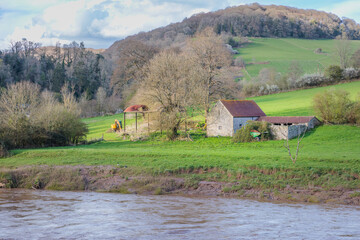 Beautiful view of the town of Tintern, Tintern Abbey, River Wye, and the nearby landscape.