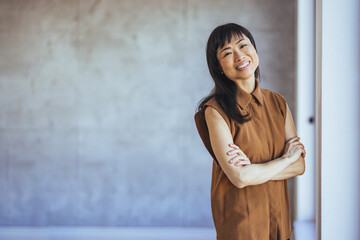 Portrait of a young asian entrepreneur. Portrait young Asian businesswoman holding...