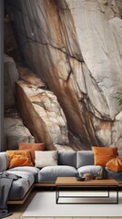 Obraz na płótnie Canvas A large wall of rock is the focal point of the room, with a couch
