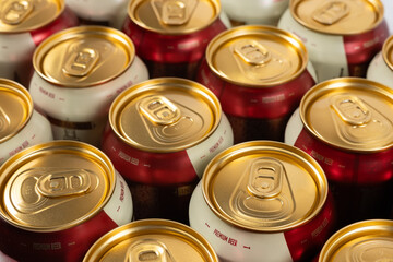 gold beer cans close up background