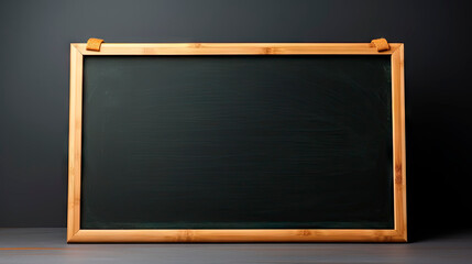 Blackboard with wooden frame on table