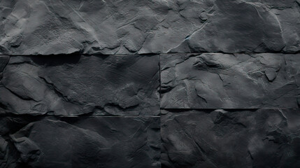 Clock on close-up black stone wall