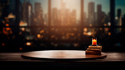 Fototapeta na wymiar A table with candle and books in front of cityscape